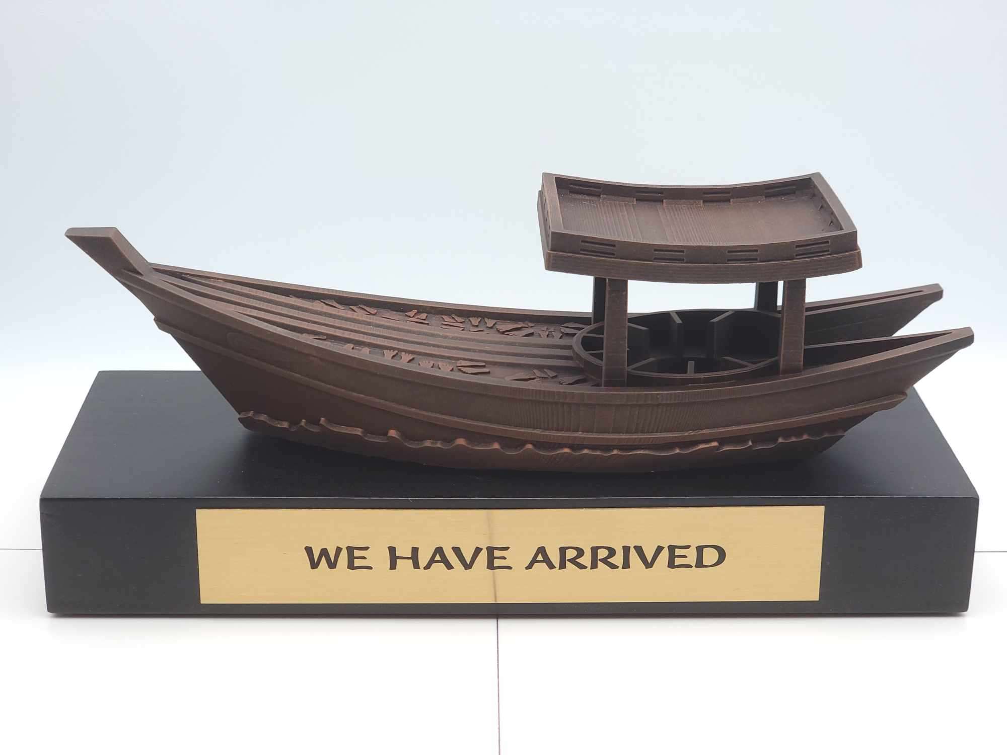3D Printed Vietnamese Refugee Boat, Copper Rub finished on black wood base with a personalized metal clicker plate