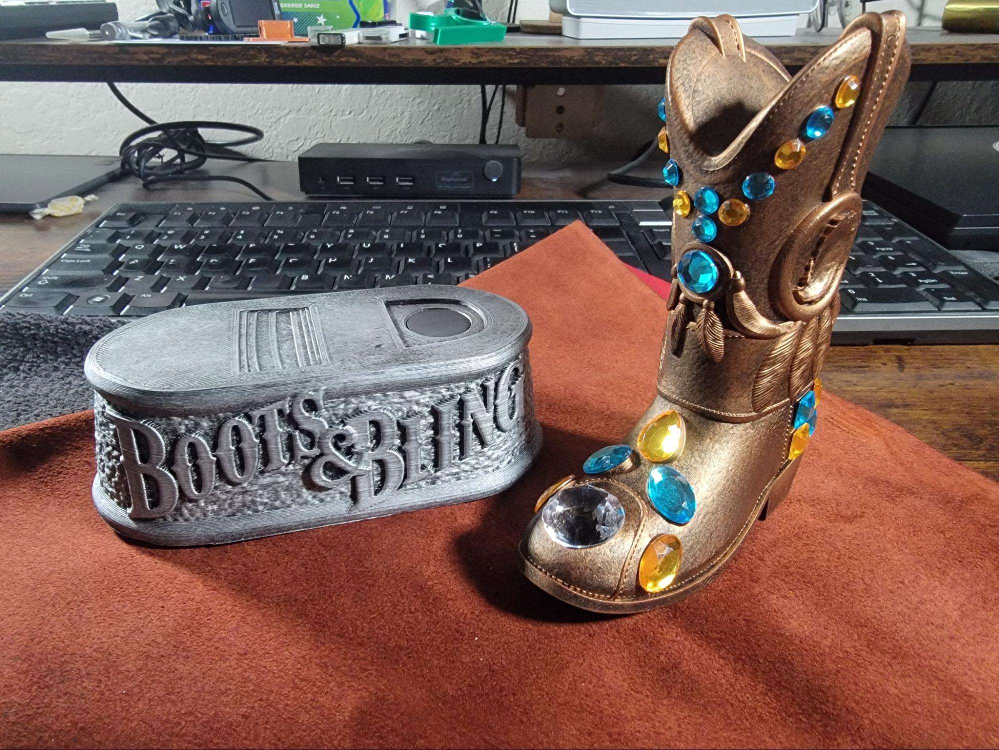 Base with silver rub finish and Boot finished in bronze rub with stones attached